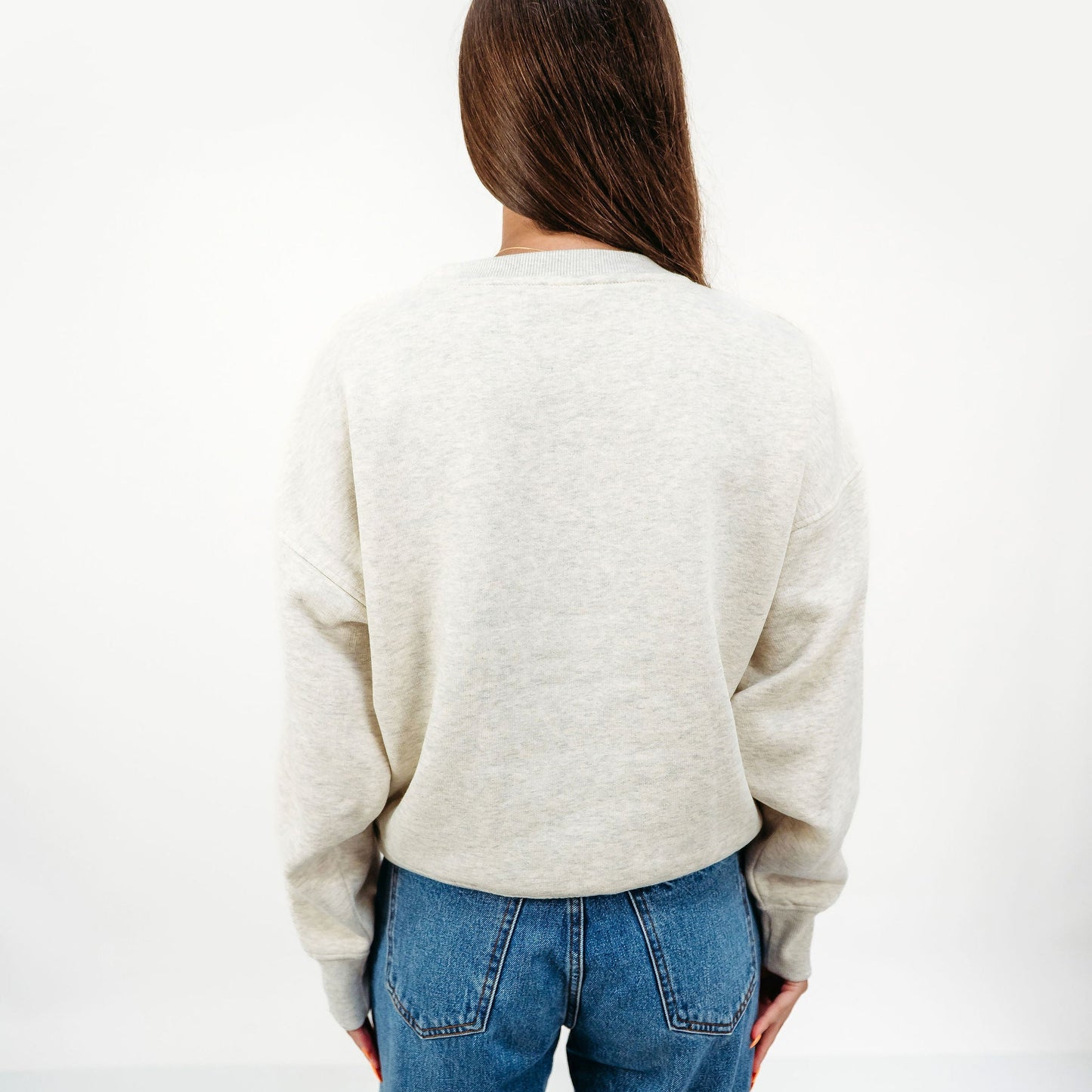 Back view of the officially licensed Illinois Fighting Illini Vintage Sequin Slouchy Drop Shoulder Crewneck.