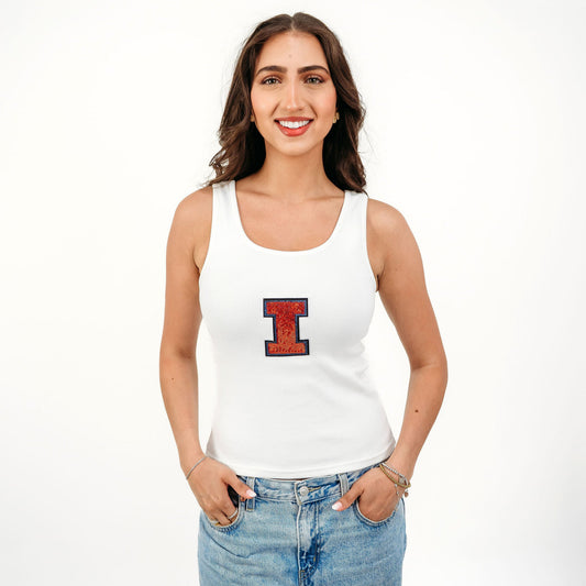 Officially licensed Illinois Fighting Illini women's ribbed tank top featuring a bold sequin Illinois script on a soft, fitted ribbed fabric. A stylish boutique game day top perfect for tailgates, football games, basketball games, and everyday collegiate wear.